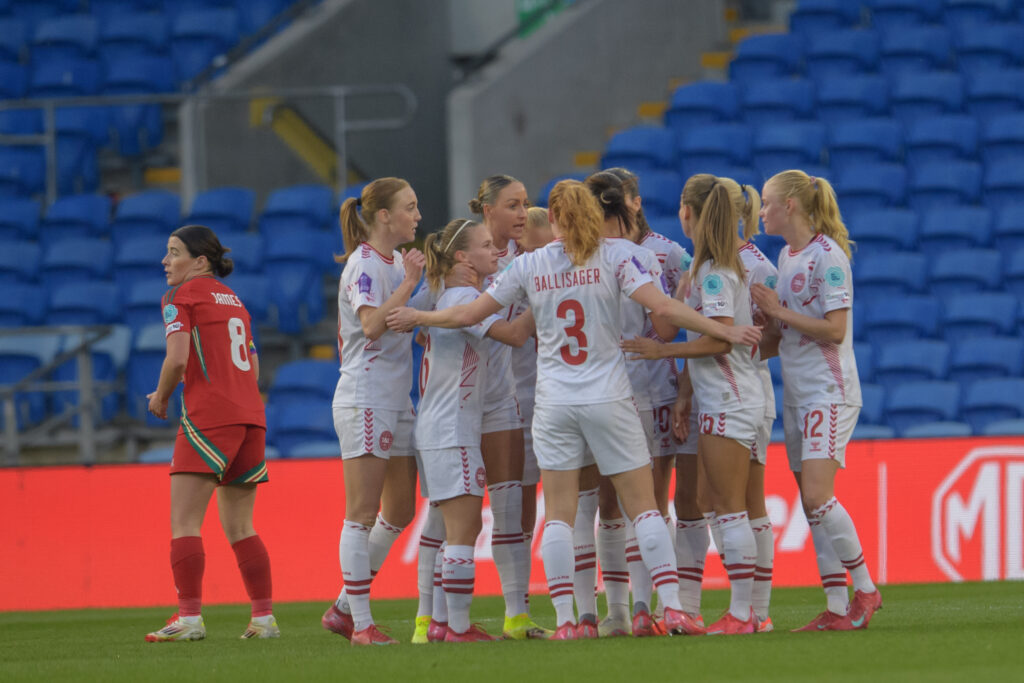 Denmark players celebrate scoring against Wales in the UEFA Nations League