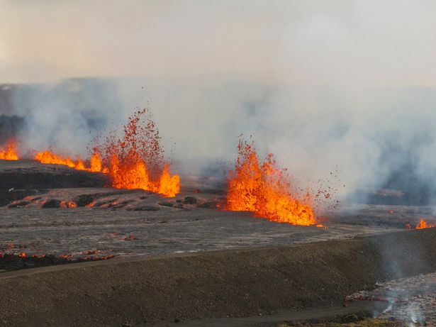 An aerial view of the volcanic eruption near the town of Grindavik, on the Reykjanes Peninsula, Iceland, Tuesday, April 1, 2025. 