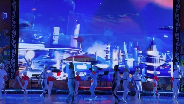 A shot of a performance by school kids for tourists in North Korea