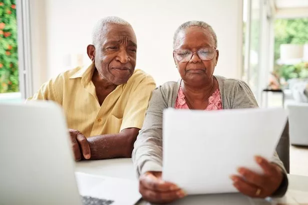 Couple reading letter
