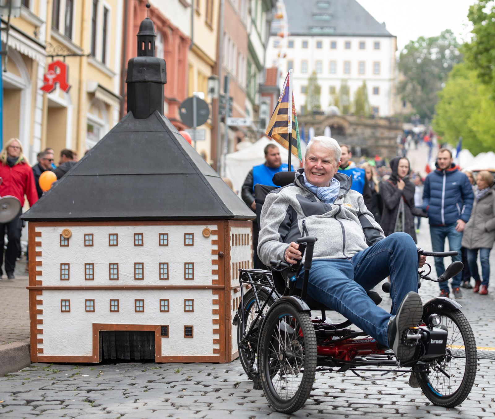Image may contain Richard Griffiths Clothing Footwear Shoe Adult Person Flag Balloon Bicycle and Transportation