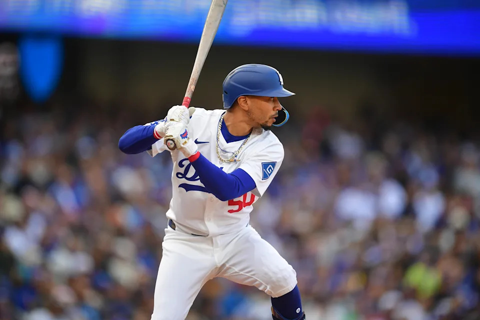 Apr 2, 2025; Los Angeles, California, USA; Los Angeles Dodgers shortstop Mookie Betts (50) bats during the first inning against the Atlanta Braves at Dodger Stadium. Mandatory Credit: Gary A. Vasquez-Imagn Images