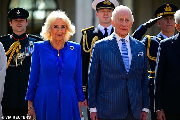 Britain's King Charles and Queen Camilla look on as they arrive for their ceremonial welcome at Quirinale Palace in Rome, Italy, April 8, 2025. Victoria Jones/Pool via REUTERS