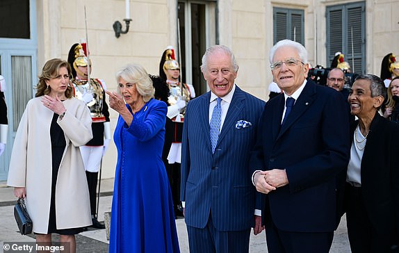 ROME, ITALY - APRIL 8: King Charles III and Queen Camilla are received by the President of the Italian Republic, His Excellency Signor Sergio Mattarella (R) and the President's daughter, Signora Laura Mattarella (L) at the Ceremonial Welcome at Quirinale Palace during day two of their State Visit on April 8, 2025 in Rome, Italy. Their Majesties will view a flypast by the Frecce Tricolori and Red Arrows and undertake meetings with the President and Signora Laura. (Photo Victoria Jones - Pool/Getty Images)