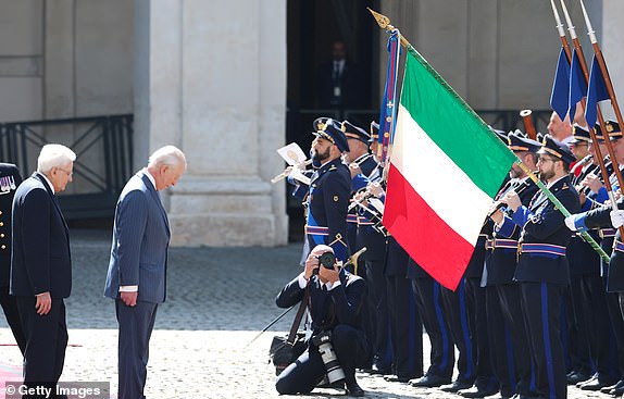 ROME, ITALY - APRIL 08: King Charles III with Italian President Sergio Mattarella (L) bows during the ceremonial welcome ceremony at the Quirinale Palace during day two of his state visit to The Republic of Italy on April 08, 2025 in Rome, Italy. (Photo by Chris Jackson/Getty Images)