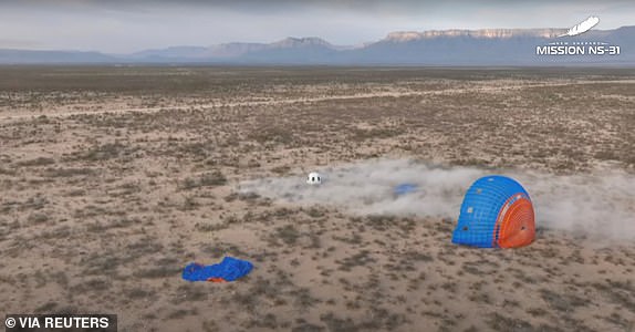 The capsule carrying Pop star Katy Perry and journalists Gayle King, Lauren Sanchez, who is also billionaire Jeff Bezos' fiance and other participants, as it landed back on earth after blasting off into space on a Blue Origin rocket, as part of the New Shepard Mission NS-31, marking the first all-female flight crew in more than six decades, in West Texas, Texas, U.S., April 14, 2025, in this screen grab taken from a video. Blue Origin/Handout via REUTERS    THIS IMAGE HAS BEEN SUPPLIED BY A THIRD PARTY. NO RESALES. NO ARCHIVES. MANDATORY CREDIT