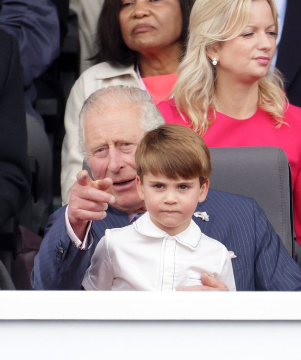 LONDON, ENGLAND - JUNE 05: Prince Louis of Cambridge sits on Prince Charles, Prince of Wales lap during the Platinum Pageant on June 05, 2022 in London, England. The Platinum Jubilee of Elizabeth II is being celebrated from June 2 to June 5, 2022, in the UK and Commonwealth to mark the 70th anniversary of the accession of Queen Elizabeth II on 6 February 1952.  (Photo by Chris Jackson - WPA Pool/Getty Images)