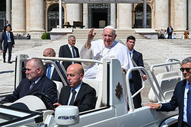 The Pope waves to people in St. Peter's Square in June 2023. <a href=