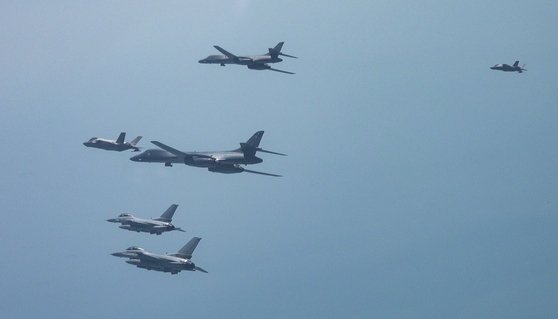 Two U.S. B-1B bombers stage joint drills with South Korean and U.S. fighter jets over the Korean Peninsula on April 15 [YONHAP] 