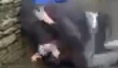 Moment dad slaps, bites, and kicks teen outside Huddersfield school