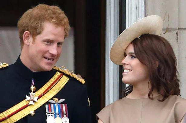 Prince Harry and Princess Eugenie stand on the balcony of Buckingham Palace during Trooping the Colour