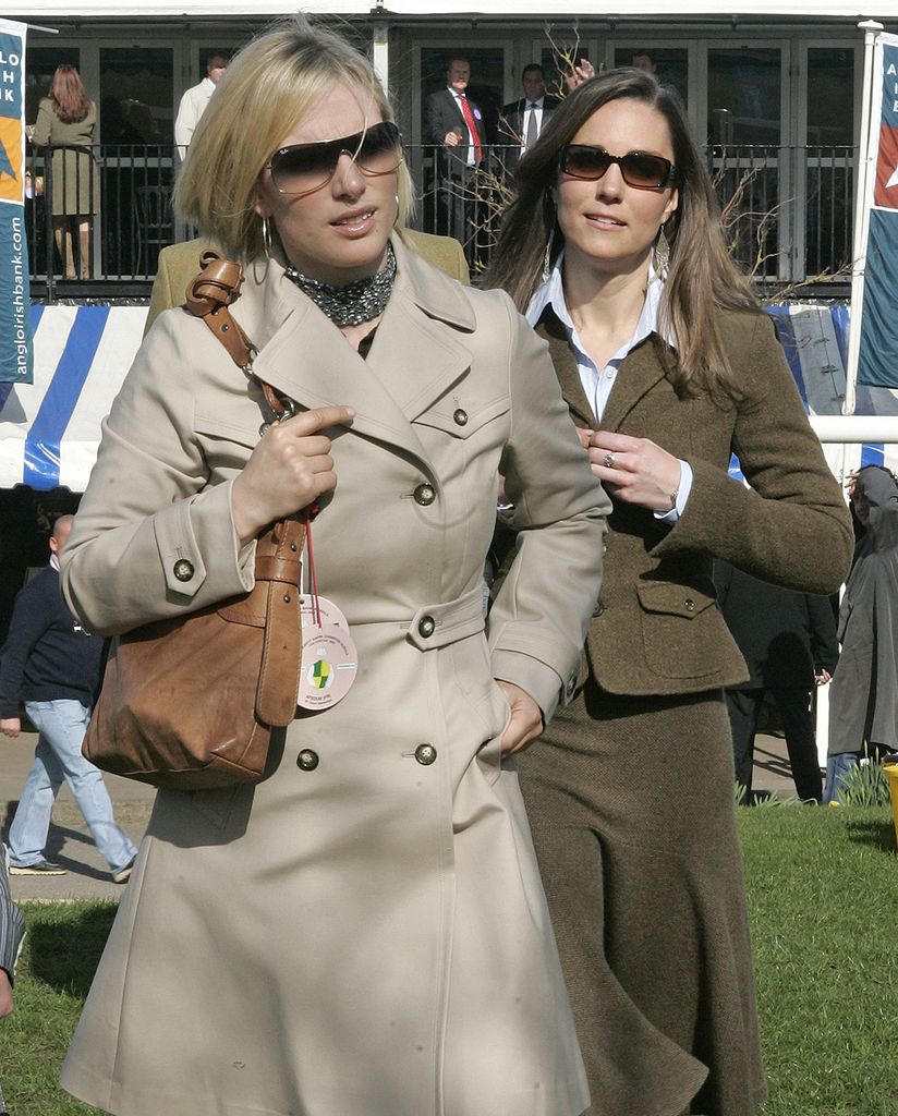 The pair donned sunglasses and boots as they stepped out at the race course