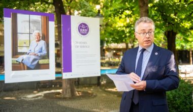 UK Ambassador Nigel Baker opens an open-air exhibition on Queen Elisabeth II on Hviezdoslavovo Square in Bratislava on August 2, 2022.