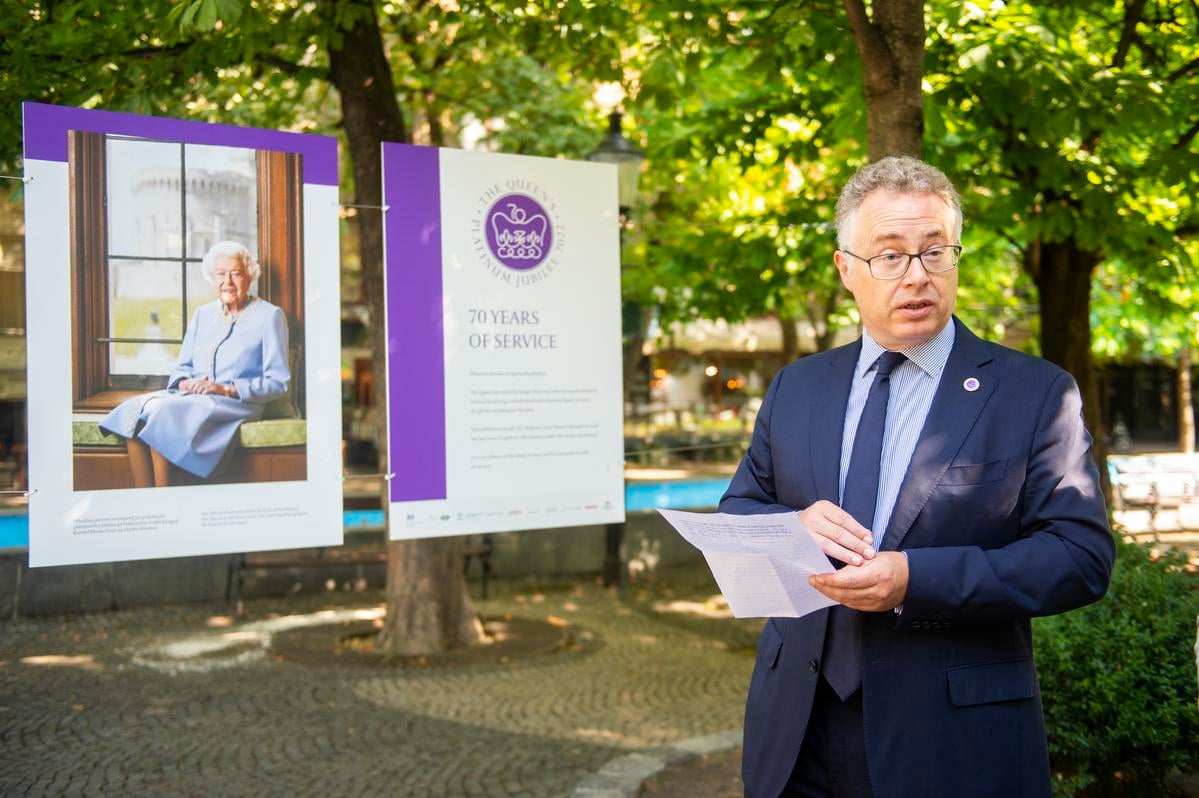 UK Ambassador Nigel Baker opens an open-air exhibition on Queen Elisabeth II on Hviezdoslavovo Square in Bratislava on August 2, 2022.