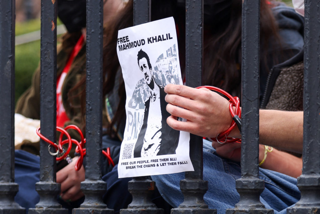 Demonstrators chain themselves to gates at Columbia University to denounce the arrest of Mahmoud Khalil in New York