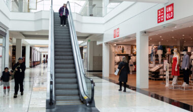 Shoppers walk past Uniqlo store in King of Prussia Mall, in King of Prussia, Pennsylvania