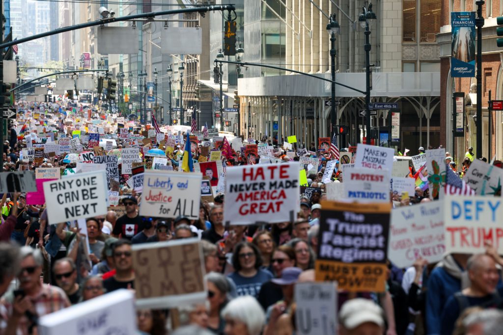 People march to “Protect Migrants, Protect the Planet” in New York