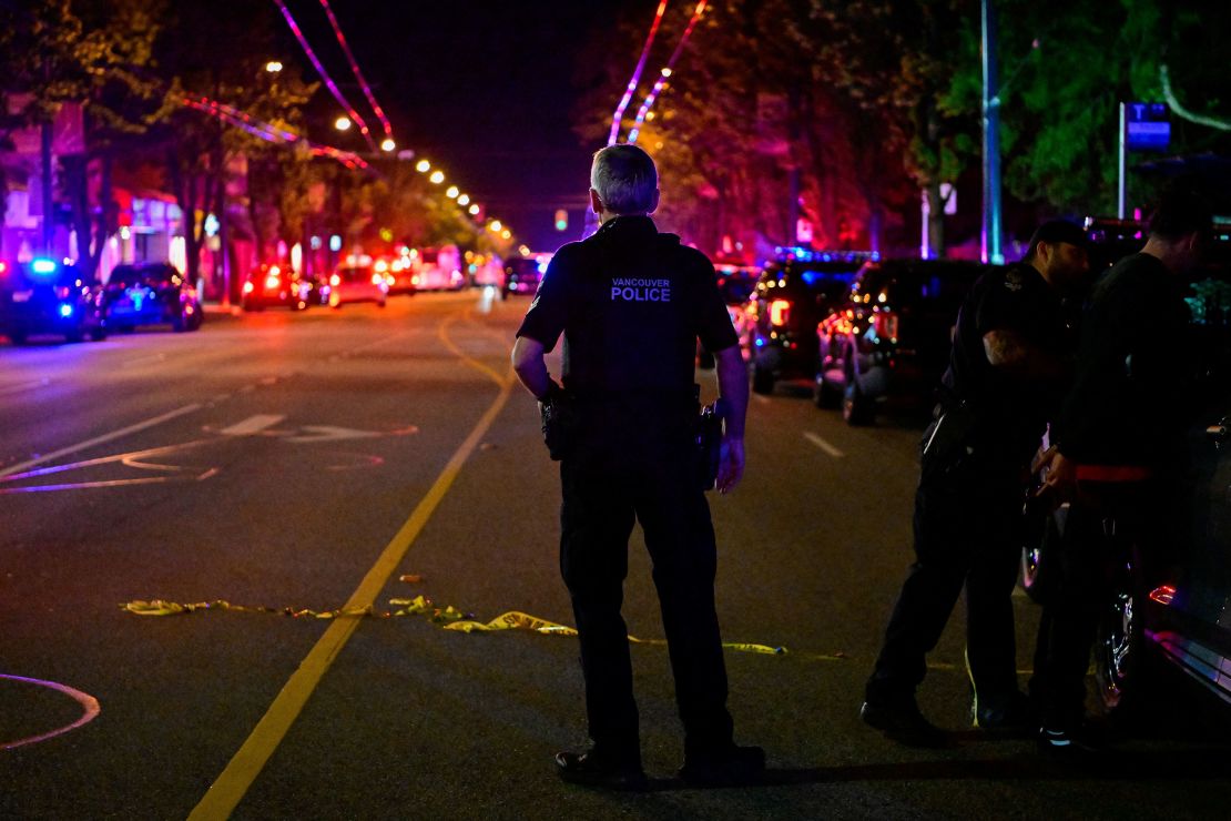 A police officer works near the site of the incident.