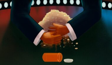 Small orange hands in oversized suit sleeves pull a pile of medications towards themselves at a poker table, as thought they were chips, as only an empty prescription bottle is left behind.