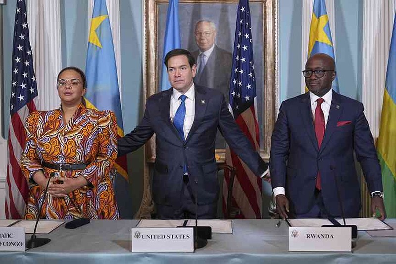 Secretary of State Marco Rubio hosts a Declaration of Principles signing ceremony with Congo's Foreign Minister Therese Kayikwamba Wagner, left, and Rwanda's Foreign Minister Olivier Nduhungirehe, right, Friday, April 25, 2025, at the State Department in Washington. (AP Photo/Jacquelyn Martin)