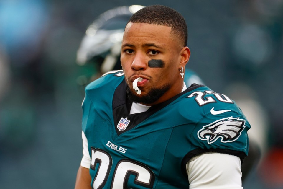 PHILADELPHIA, PENNSYLVANIA - JANUARY 19: Saquon Barkley #26 of the Philadelphia Eagles warms up on the field prior to the NFC Divisional Playoff game against the Los Angeles Rams at Lincoln Financial Field on January 19, 2025 in Philadelphia, Pennsylvania. (Photo by Brandon Sloter/Getty Images)