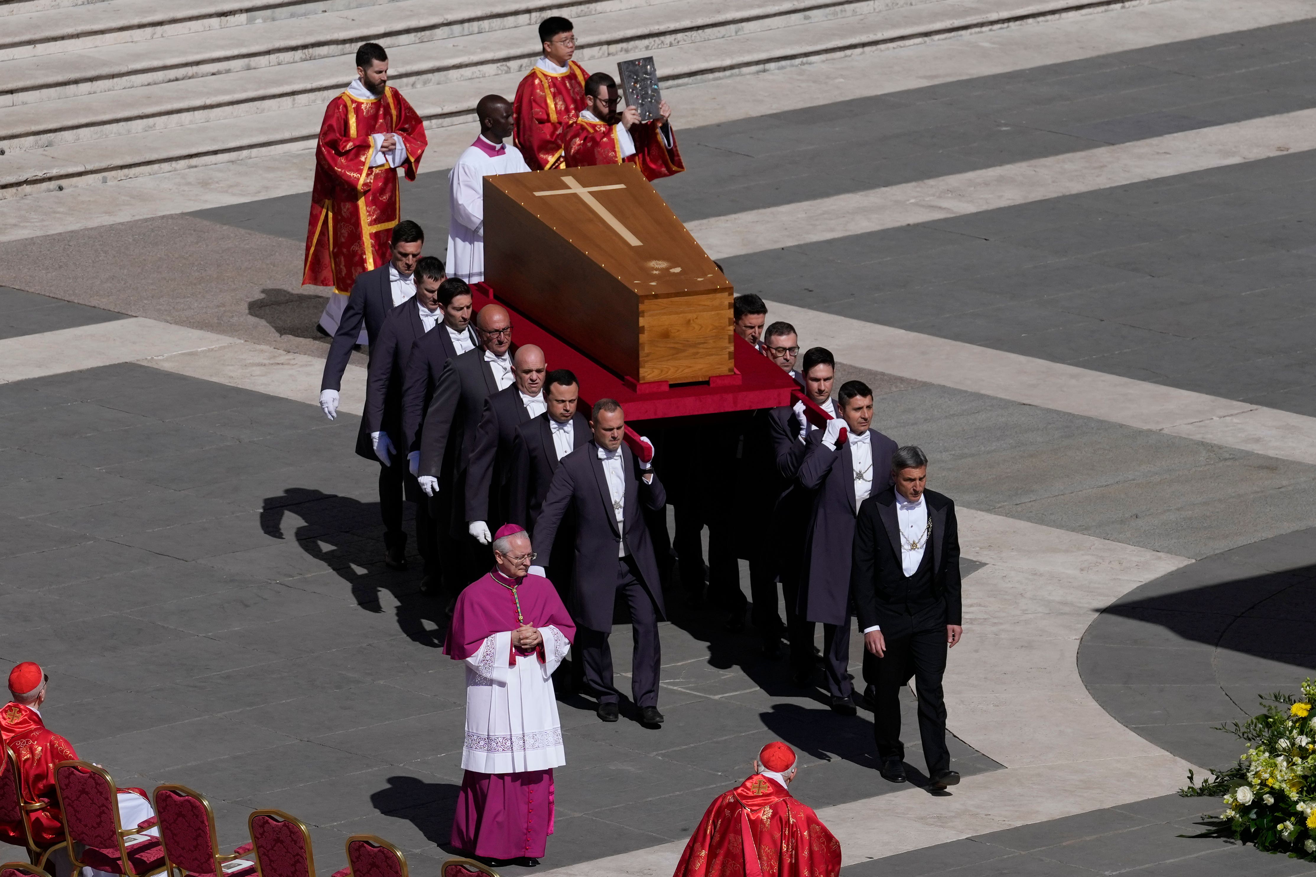 The coffin of Pope Francis is carried into St Peter’s Square for his funeral (Gregorio Borgia/AP)