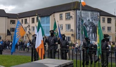 Police attacked with petrol bombs as masked men lead New IRA parade through Derry