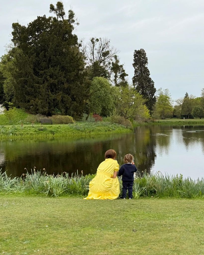 Princess Eugenie crouching by water with son Ernest at Royal Lodge