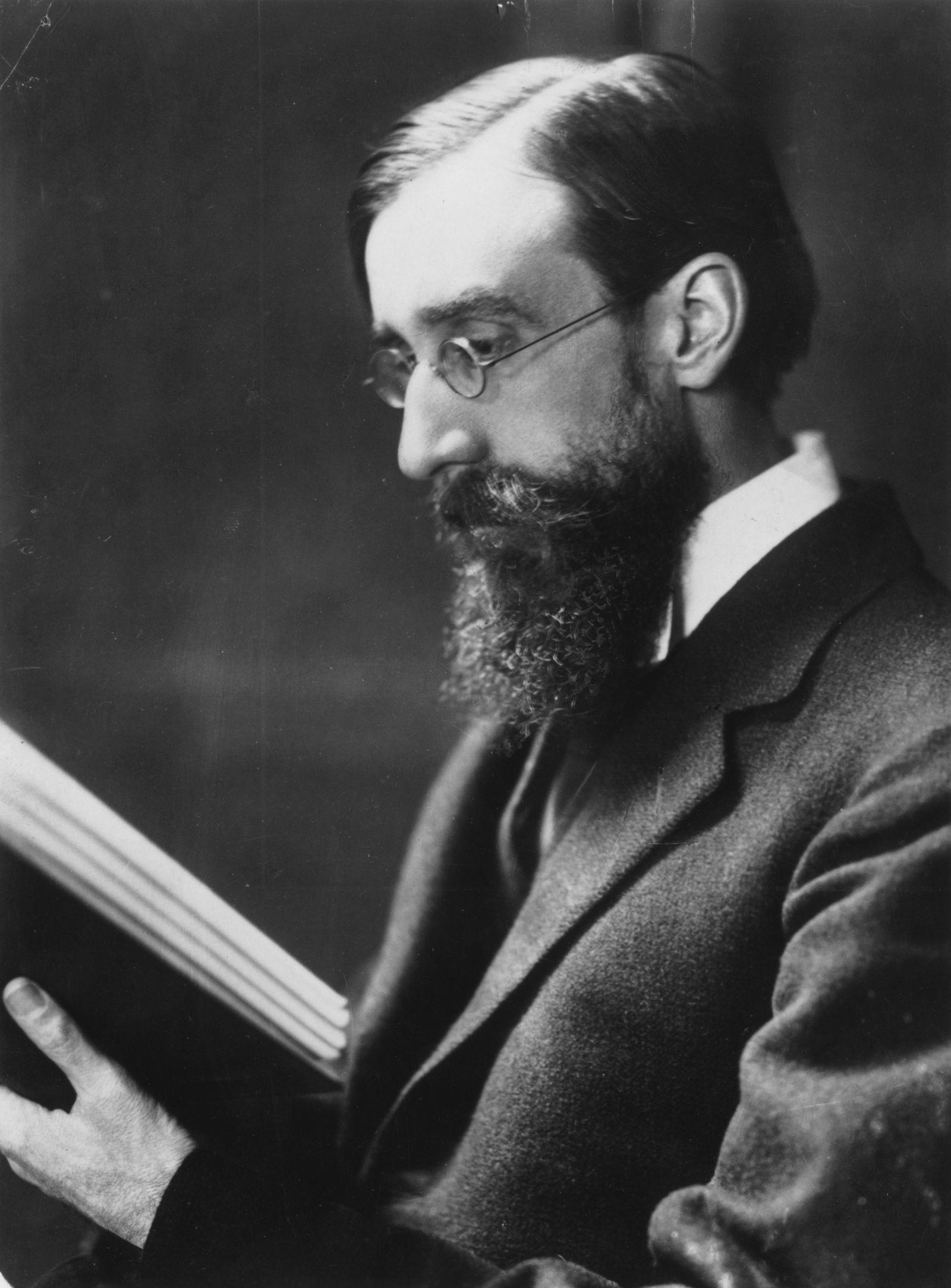 Image may contain Lytton Strachey Head Person Face Photography Portrait Beard Adult Accessories and Glasses
