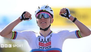 Tadej Pogacar celebrates winning the Tour of Flanders