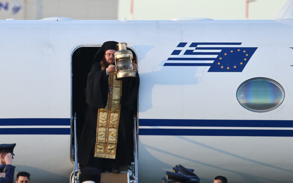 ‘Holy Light’ from Jerusalem arrives in Greece for Easter celebrations