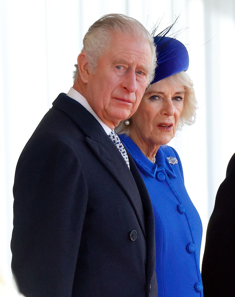Charles and Camilla looking serious at 2022 state visit