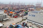 Shipping containers are seen ready for transport at the Guangzhou Port in the Nansha district in southern China's Guangdong province on Thursday, April 17, 2025.