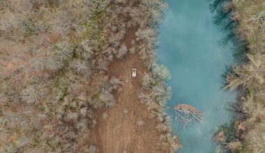 A drone view shows remote-controlled deminer vehicle working on a field near Gospic