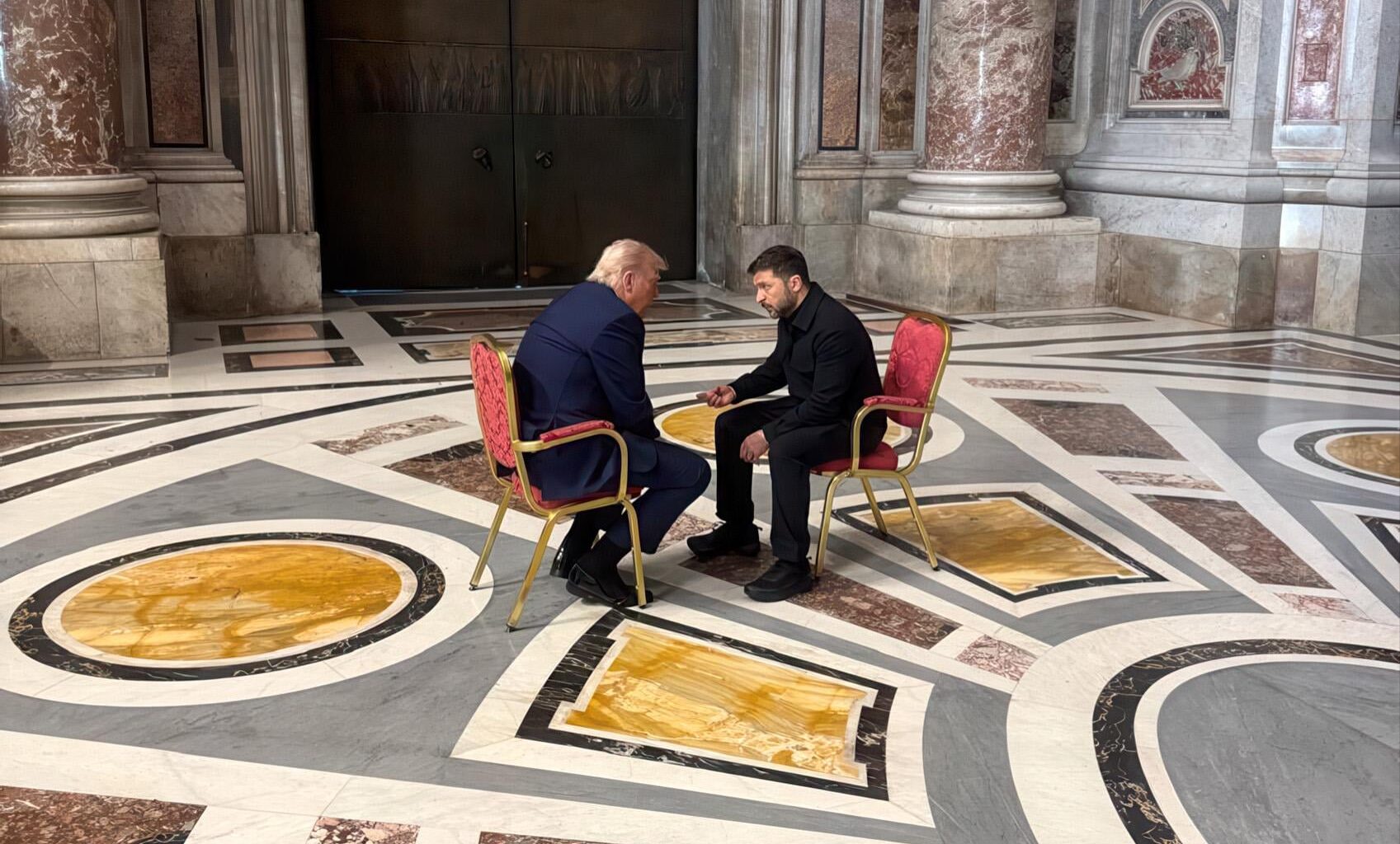 Trump & Zelensky meet inside St Peter's Basilica ahead of Pope Francis' funeral. Both appear deep in conversation. Zelensky later called the meeting "very symbolic" with the "potential to become historic".
