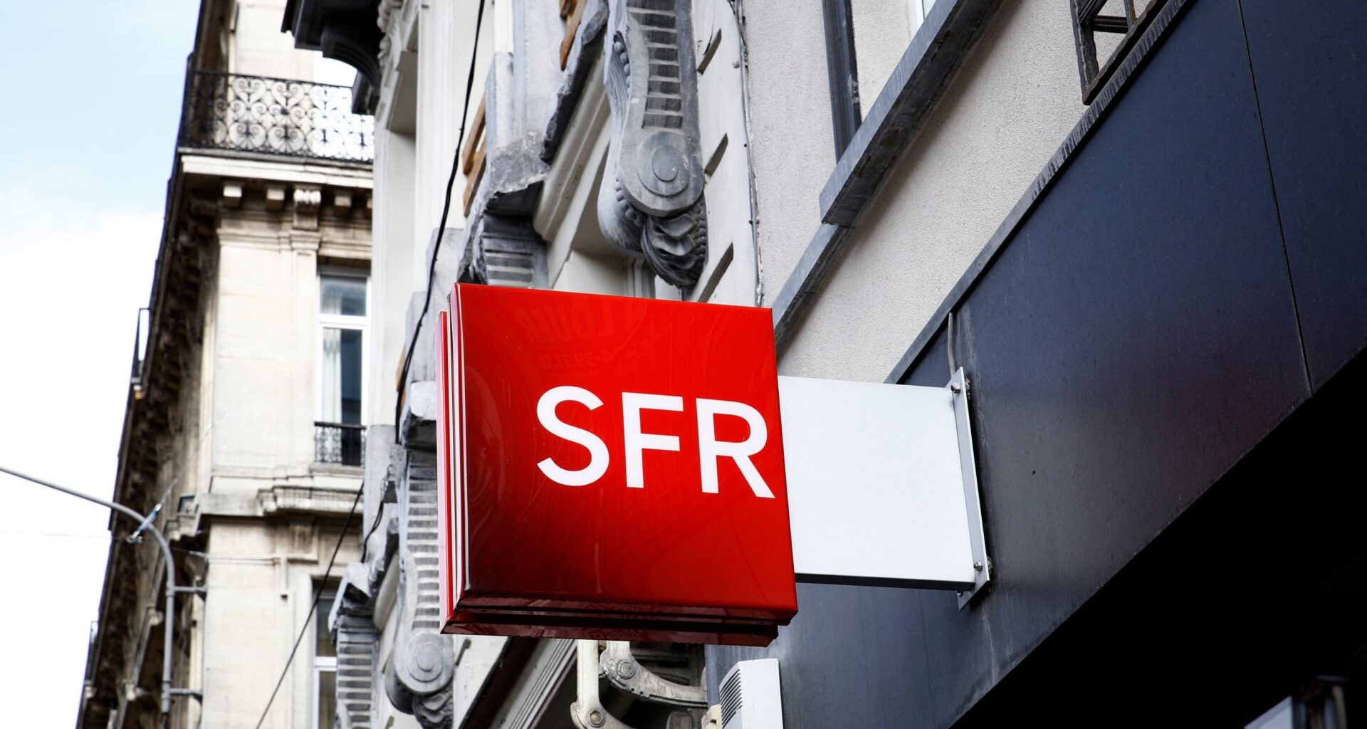 Patrick Drahi envisagerait de vendre SFR : un tournant pour les télécoms en France