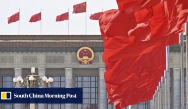 China moves to protect economy from trade war, vows to hit 5% growth target