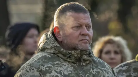 Reuters Zaluzhnyi in uniform during a Holodomor commemoration