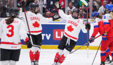 Poulin leads Canada over hosts
