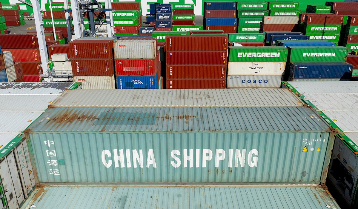 Stocks tumble into the red as trade war fears offset slowing UK inflation