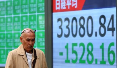 Japan's Nikkei slumps on trade war worries, stronger yen