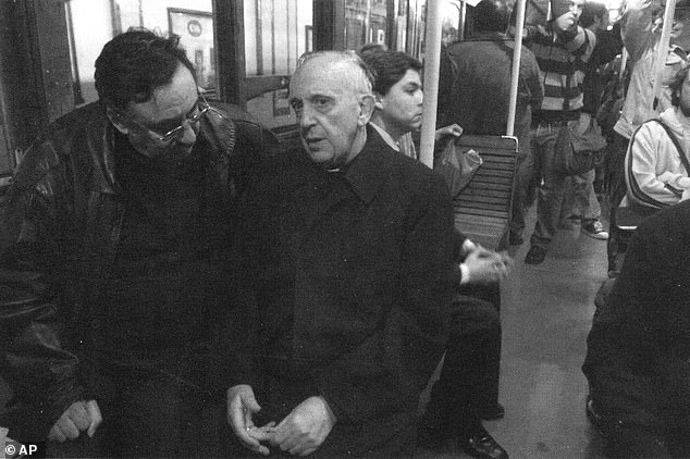 Journalist Sergio Rubin with Argentine Cardinal Jorge Mario Bergoglio on the subway in Buenos Aires, Argentina in 2009 where the then archbishop was known for taking the subway and mingling with the poor of Buenos Aires