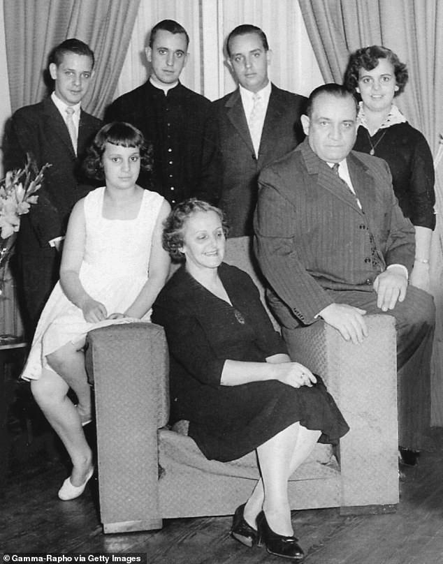 A Bergoglio family gathering, from left, standing, brother Alberto Horacio, Jorge, brother Oscar Adrian and sister Marta Regina, sitting, sister Maria Elena, mother Regina and father Mario Jose Francisco