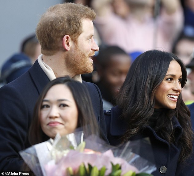 Heather Wong is pictured with the Duke and Duchess of Sussex at a charity fair in Nottingham in December 2017