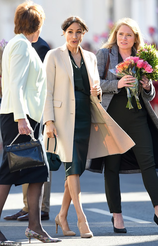 Amy Pickerill walks with her boss Meghan. She would step down as private secretary after the birth of Prince Archie in May 2019