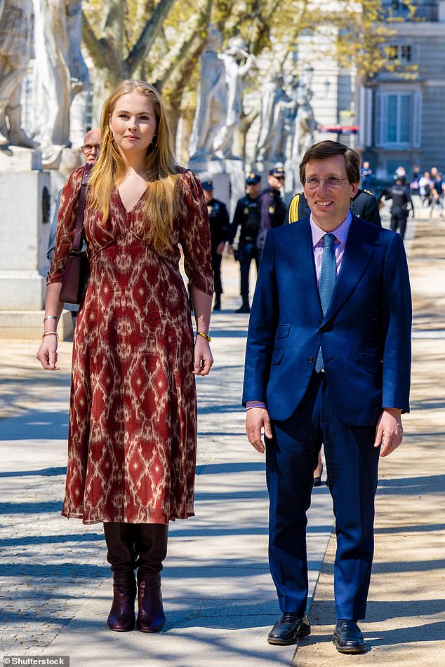 Princess Catherine-Amalia, 21, stands almost a head taller than Madrid's mayor, José Luis Martinez-Almeida, 49, during her royal engagement to unveil a commemorative plaque in the Spanish capital