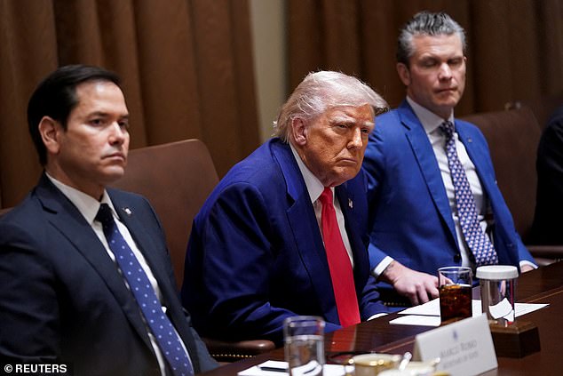 US President Donald Trump, Secretary of Defense Pete Hegseth and Secretary of State Marco Rubio attend a cabinet meeting at the White House in Washington