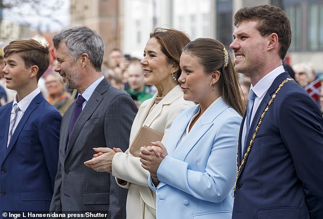The royal wore her thick glossy tresses in two a half-up do and sported a soft neutral makeup look