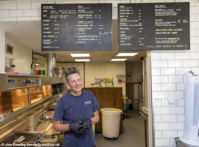Miranda Hayley, 53, head fryer at Simpsons fish and chip shop, Stroud, said they do not pass costs onto their customers in full 'because if we did, they might stop coming in'