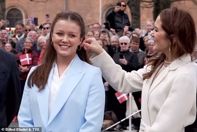 The sweet moment was captured on film, with royal fans praising the two women for 'still smiling'. Another said: 'What a sweet moment between Mary and Isabella'